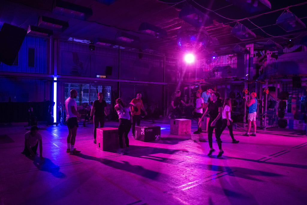A .beat group session under pink lights at The Warehouse